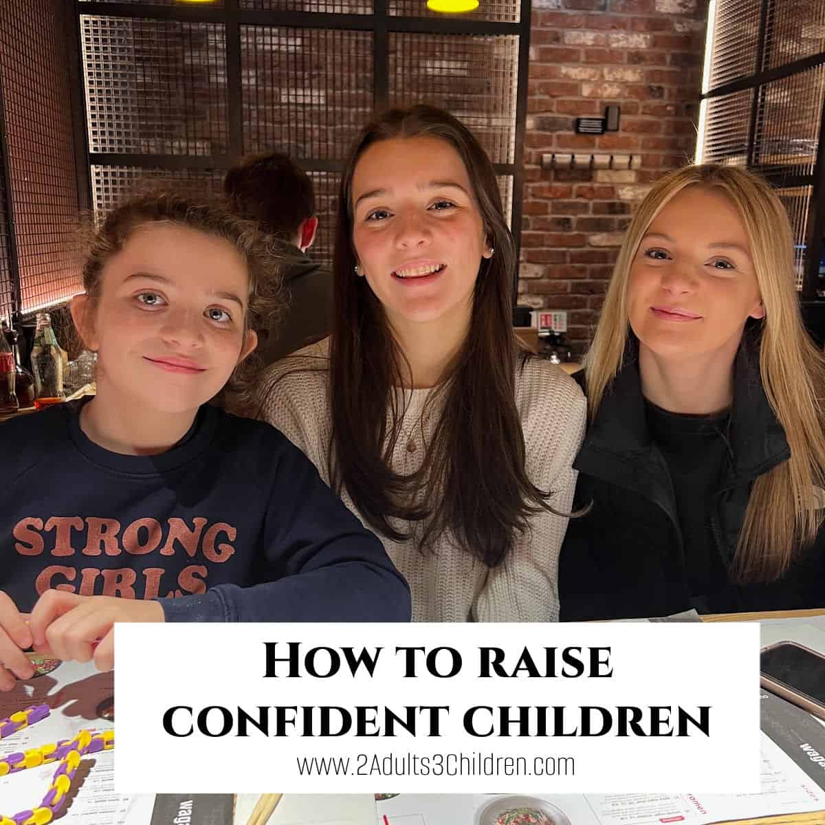 Title page for helping your child to be more confident, showing 3 teenage sister in a restaurant smiling.